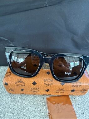 MCM Glossy Black Oversized Cat-Eye Sunglasses with Dark Lenses